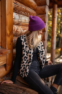 Women's knitted vest with leopard print and button closure