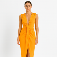 Elegant evening dress | Draped design and deep V-neckline | Chic and sophisticated